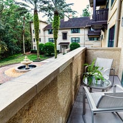 1BR - fountain view-balcony-65 in TV-wood floors-heated pool-hot tub!