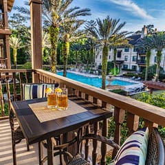 5208-1 Pool front view- no carpet- balcony over pool courtyard w/ hot tub