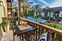 5208-1 Pool front view- no carpet- balcony over pool courtyard w/ hot tub - Image 5