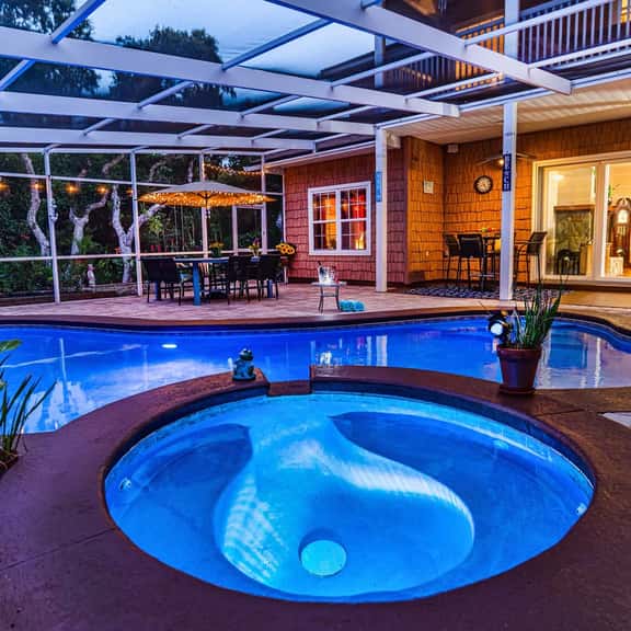 Salt water pool - jacuzzi - BBQ - walk to beach - large screened lanai - Image 1