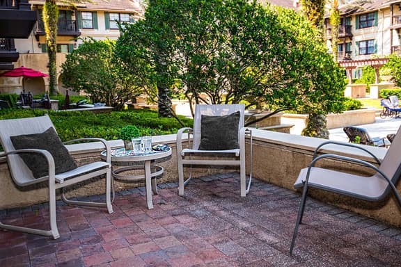 5112  pool front w/ patio- hot tub- sleeper sofa- near historic district - Image 1